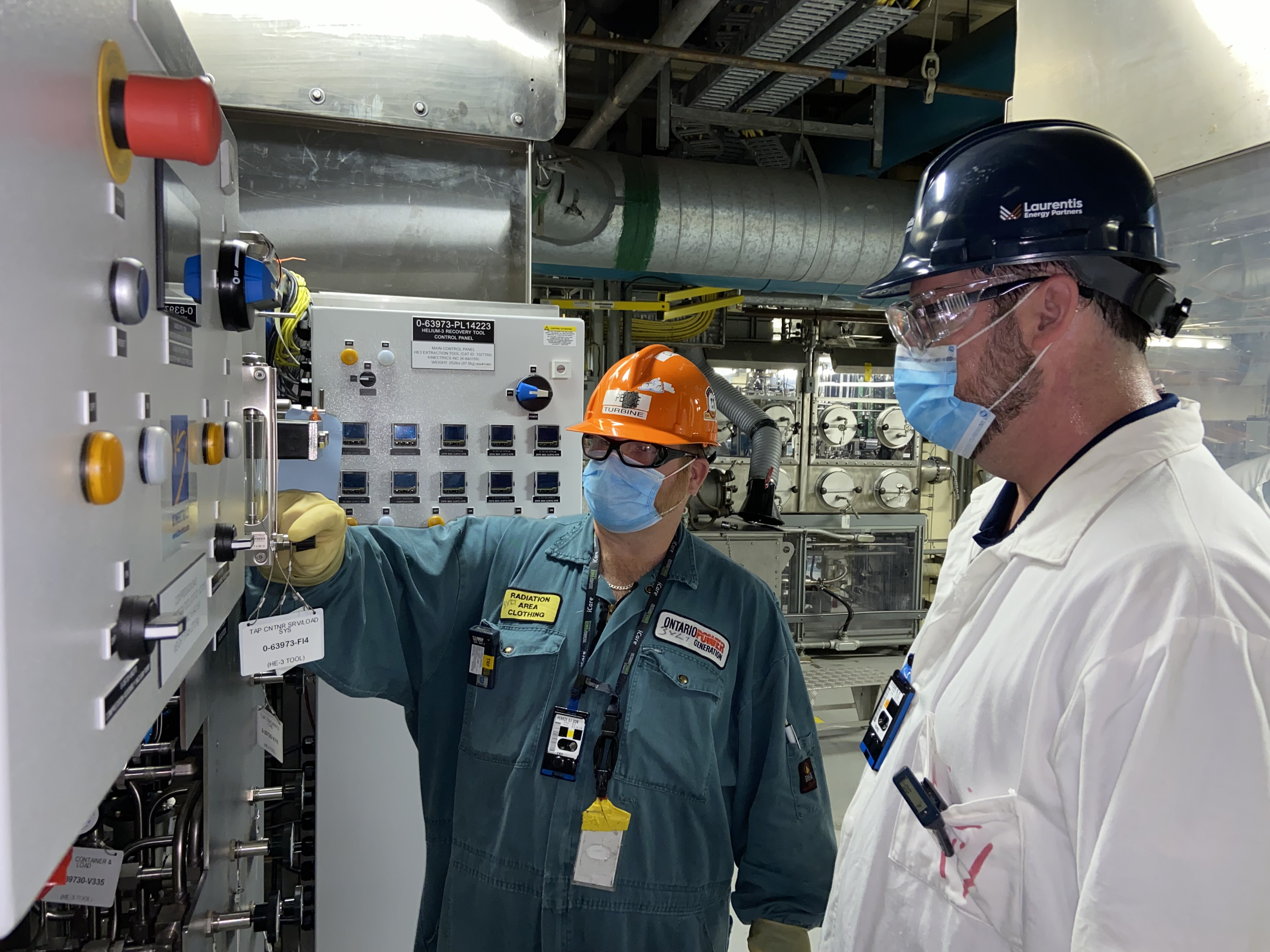 Laurentis's Mike Lefebvre (right) and OPG's Don Perrie (left) inspect He-3 Tool